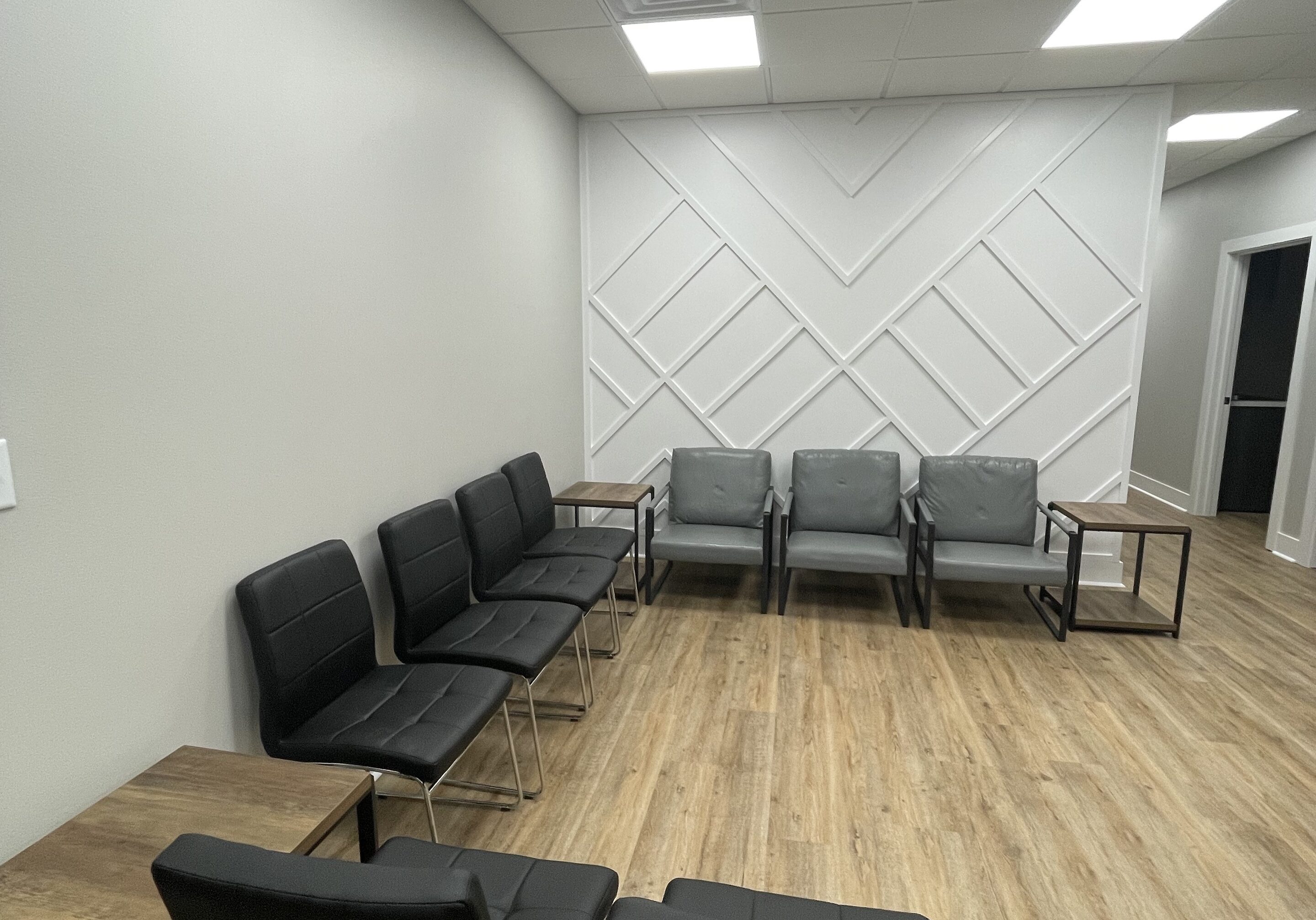 hometown-health-and-wellness_commercial-medical-clinic_benton-ar_waiting-room-entry-receptin-wall-trim_rye-general-contractors-4K.jpg